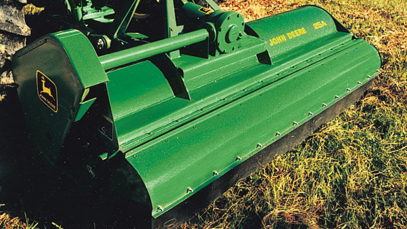close up image of 25A flail mower in a field