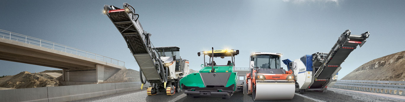  lineup of 4 Wirtgen Group pieces of equipment on a roadbuilding jobsite