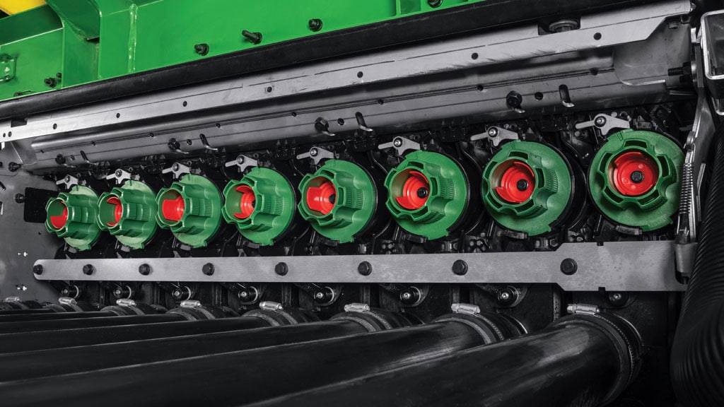 Photo of the stainless-steel electric meters in a John Deere C-Series air cart.
