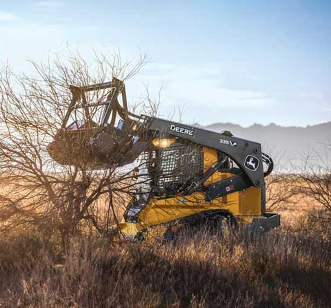 Compact Track Loader moving brush.