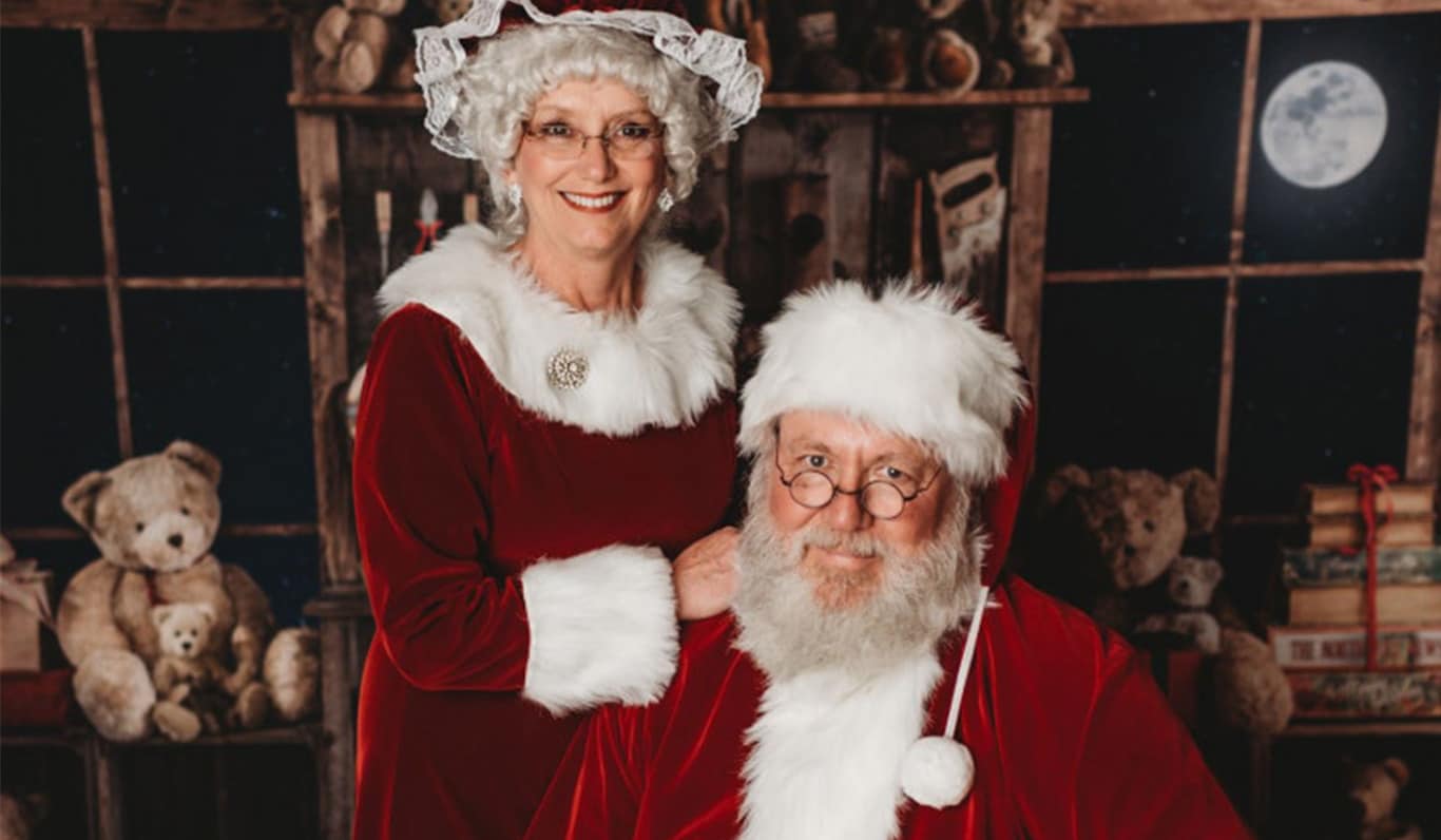 Santa and Mrs. Claus smile for the camera