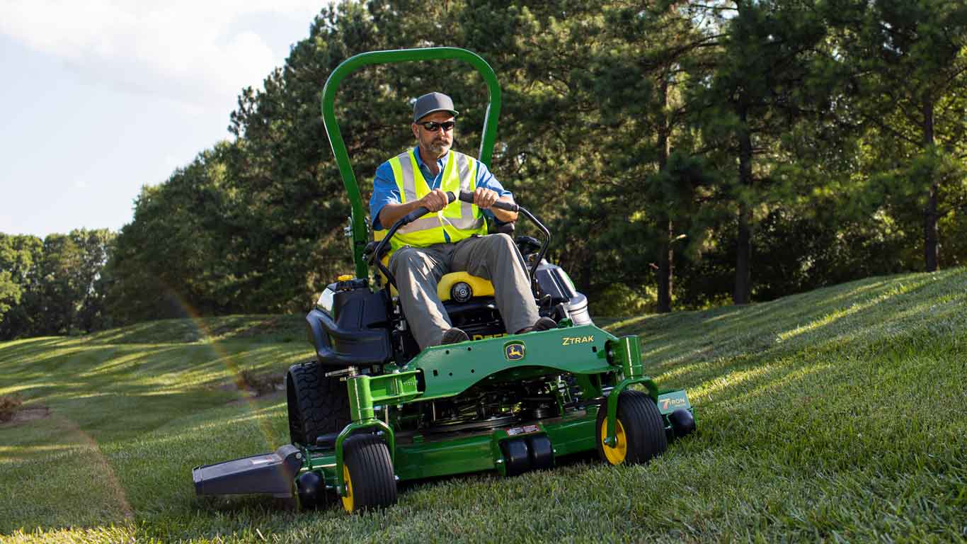 Man mowing with a John Deere ZTrak