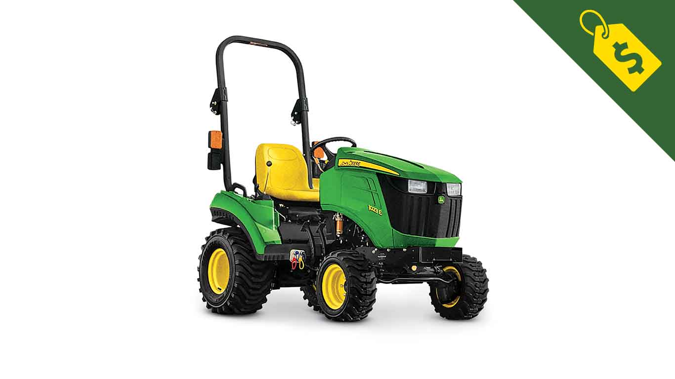 Studio image of a John Deere 1023E Sub-Compact Tractor with a sales tag icon with a dollar sign on it