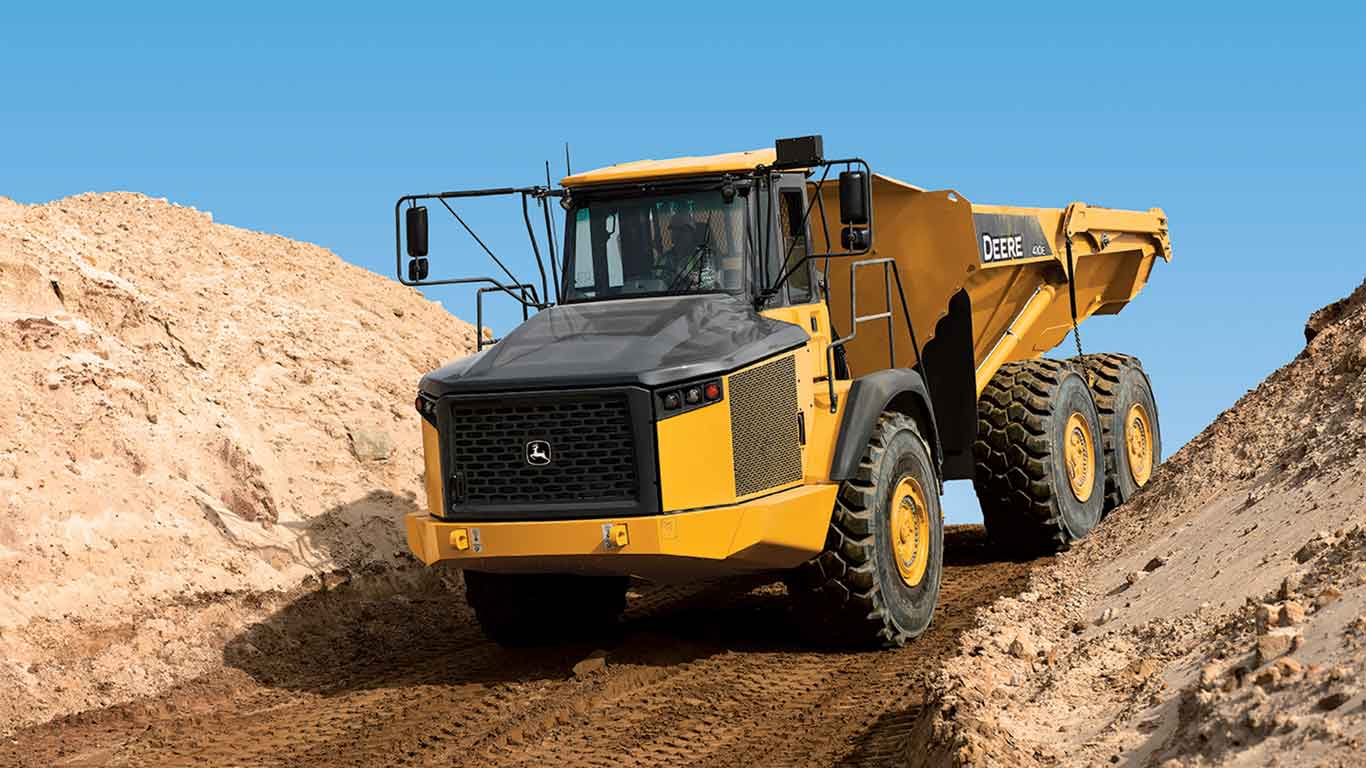 John Deere construction equipment operating at a worksite