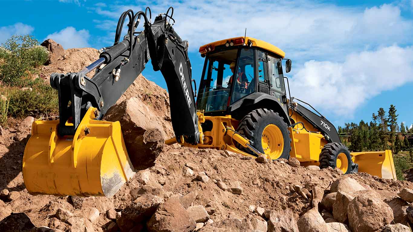 John Deere construction equipment on a worksite