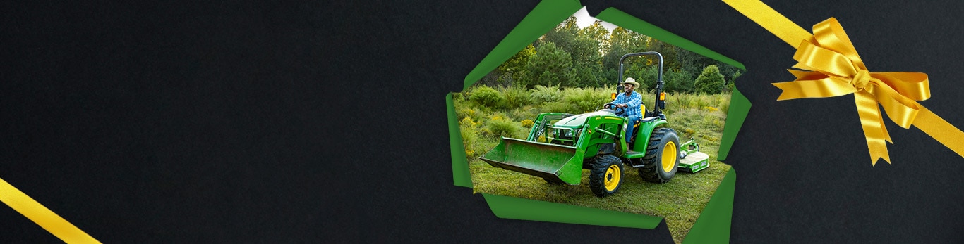 Lawn tractor with loader attachment in field, surrounded by a gift wrapping border.
