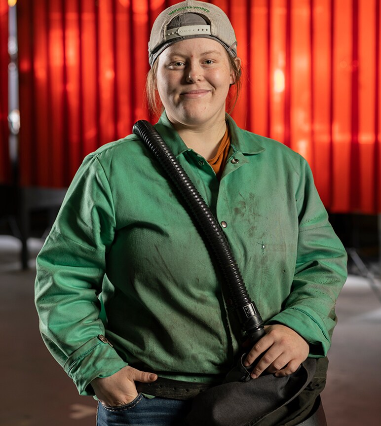 Photo of Abigail Parsons in her welding gear