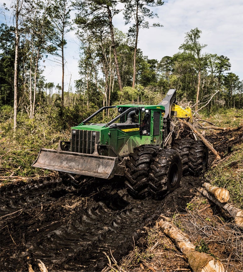 948L-II Grapple Skidders moving logs from the jobsite.