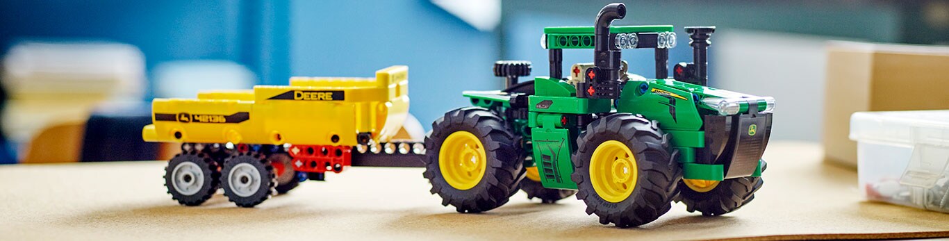 LEGO Technic John Deere 9620R 4WD tractor and trailer building set.