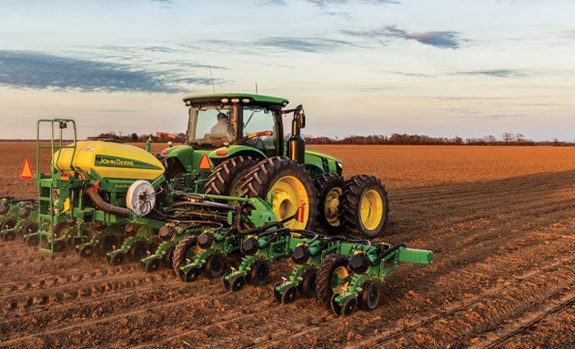 John Deere tractor using Exact Emerge to plant a field.