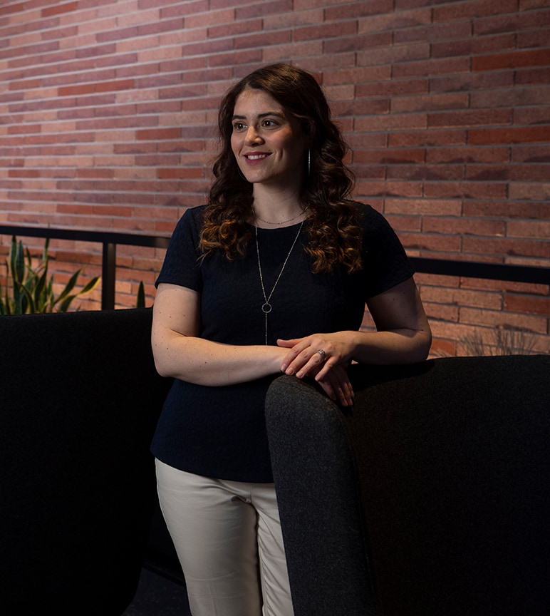 Johanna Acevedo stands in the new Chicago office where she is helping recruit new employees.