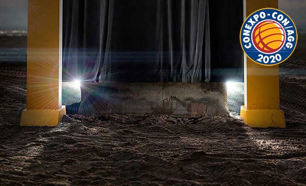 A curtain rises, revealing a machine blade between two pillars of a John Deere dealership sign.  Logo reads "CONEXPO-CON/AGG 2020". 