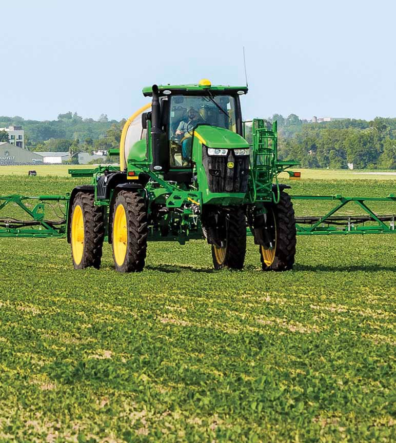 John Deere Sprayer equipped with See &amp; Spray Premium spraying a field