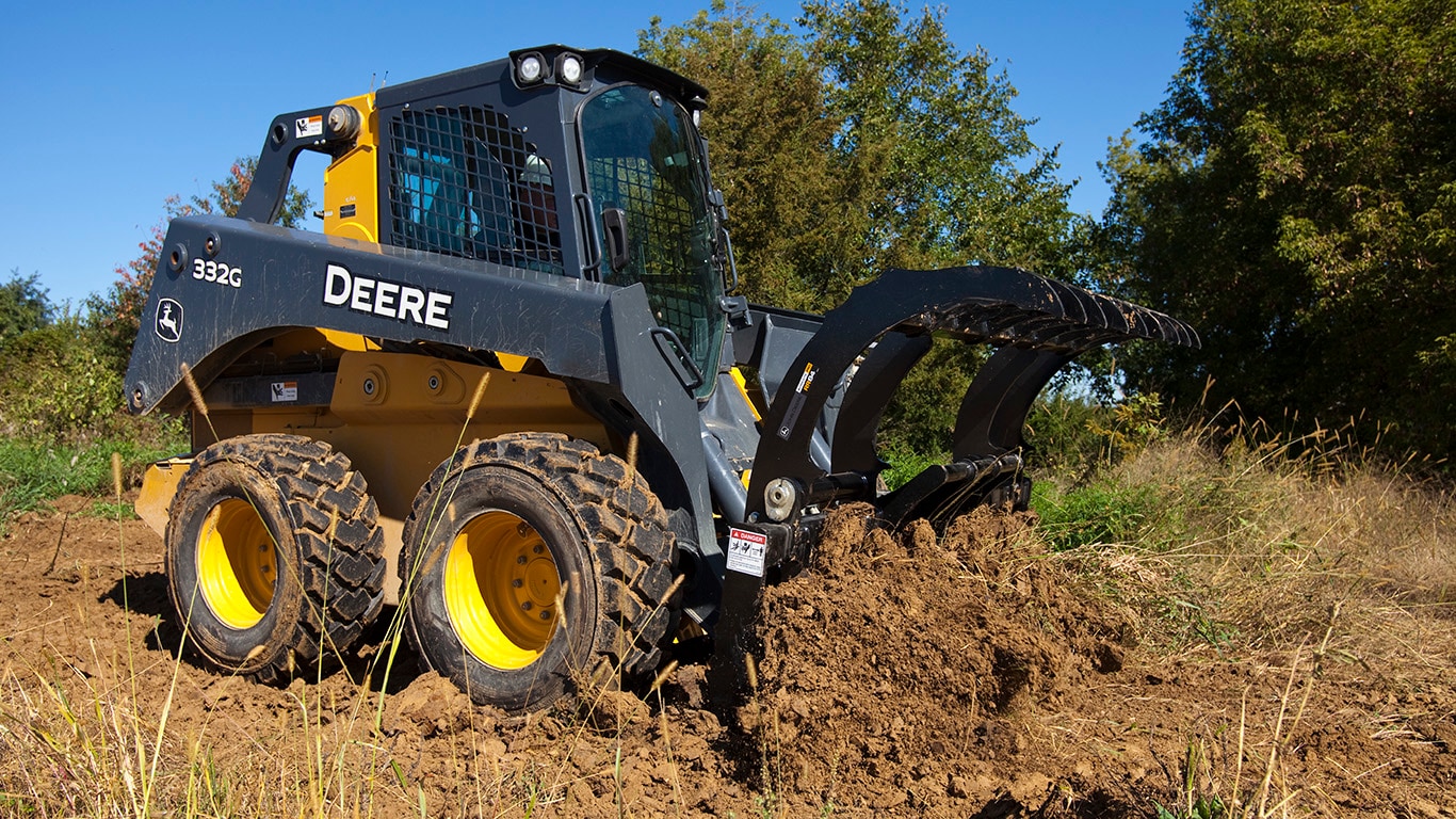 Root Rake attachment on 332G Skid Steer