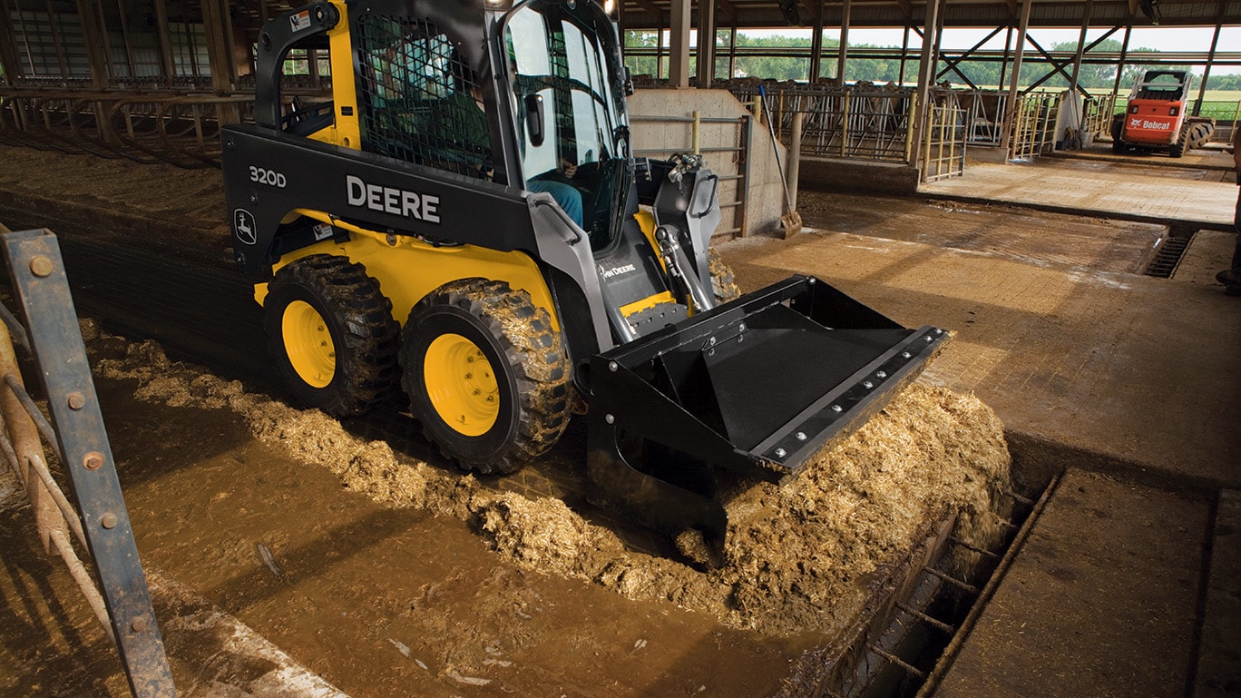 Material Scraper with Skid Steer John Deere