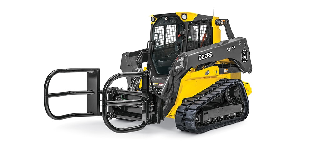 John Deere 331G Compact Track Loader with an AH80 Bale Hugger attachment on a white background.