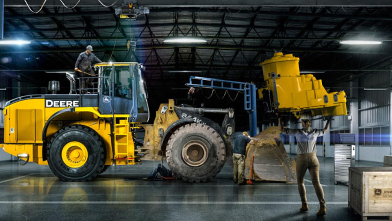 image of technicians rebuilding a wheel loader