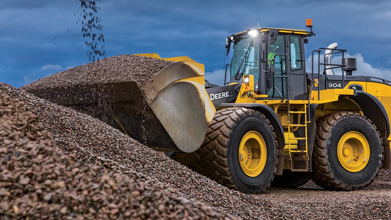 904 wheel loader moving rock on job site.