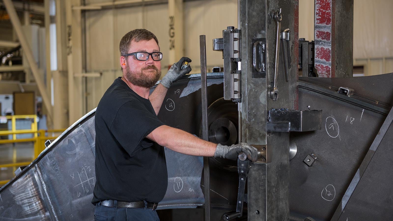Joe Walker, a machining technician, shown working in the Deere-Hitachi factory