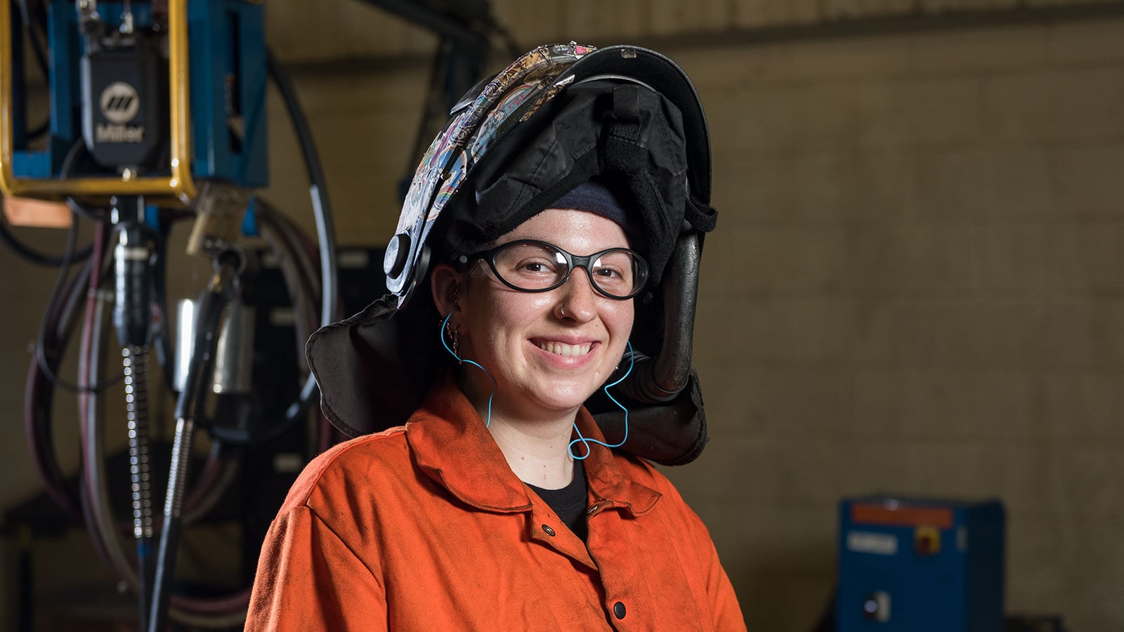 Sam McCart, a welder, shown working in the Deere-Hitachi factory