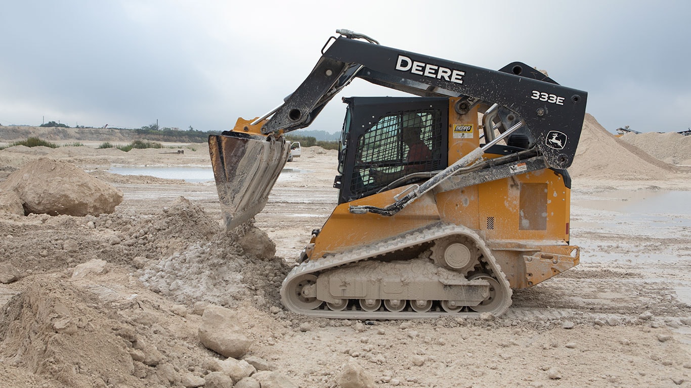 A 333G dumping material in a quarry in Florida