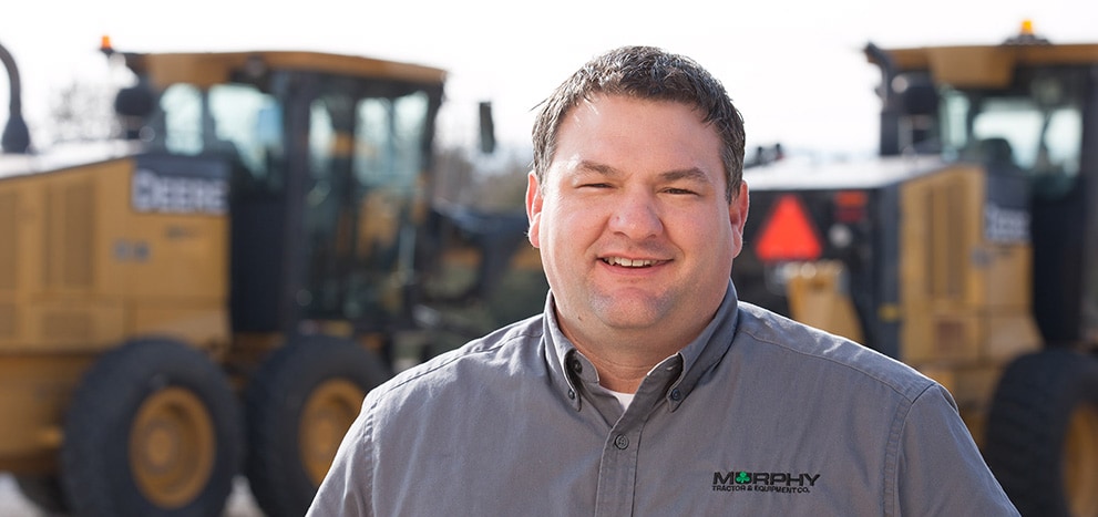 Doug Jacobsen with Murphy Tractor poses for a photo