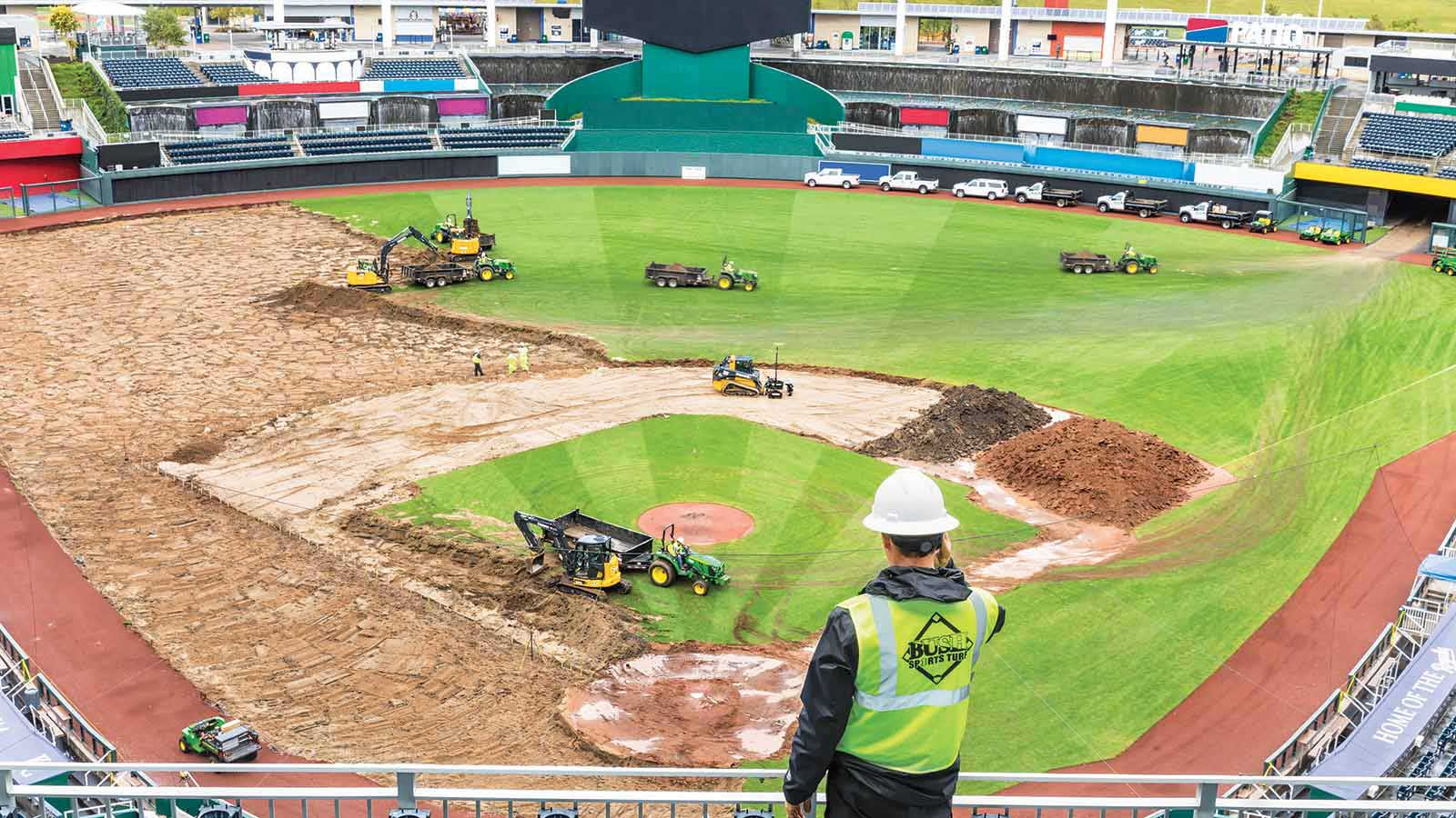 Steve Bush, owner of Bush Sports Turf, watches his all-Deere fleet in action in the Kansas City Royals’ Kauffman Stadium.