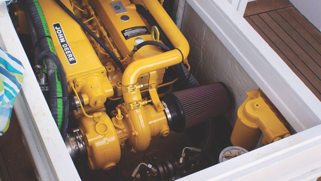 John Deere 4 Cylinder Marine Engine in the Engine Room on Boat April