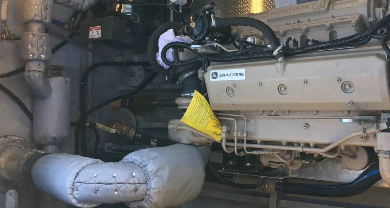 Twin John Deere PowerTech marine engines inside Gulf Star crew boat powering the commercial vessel