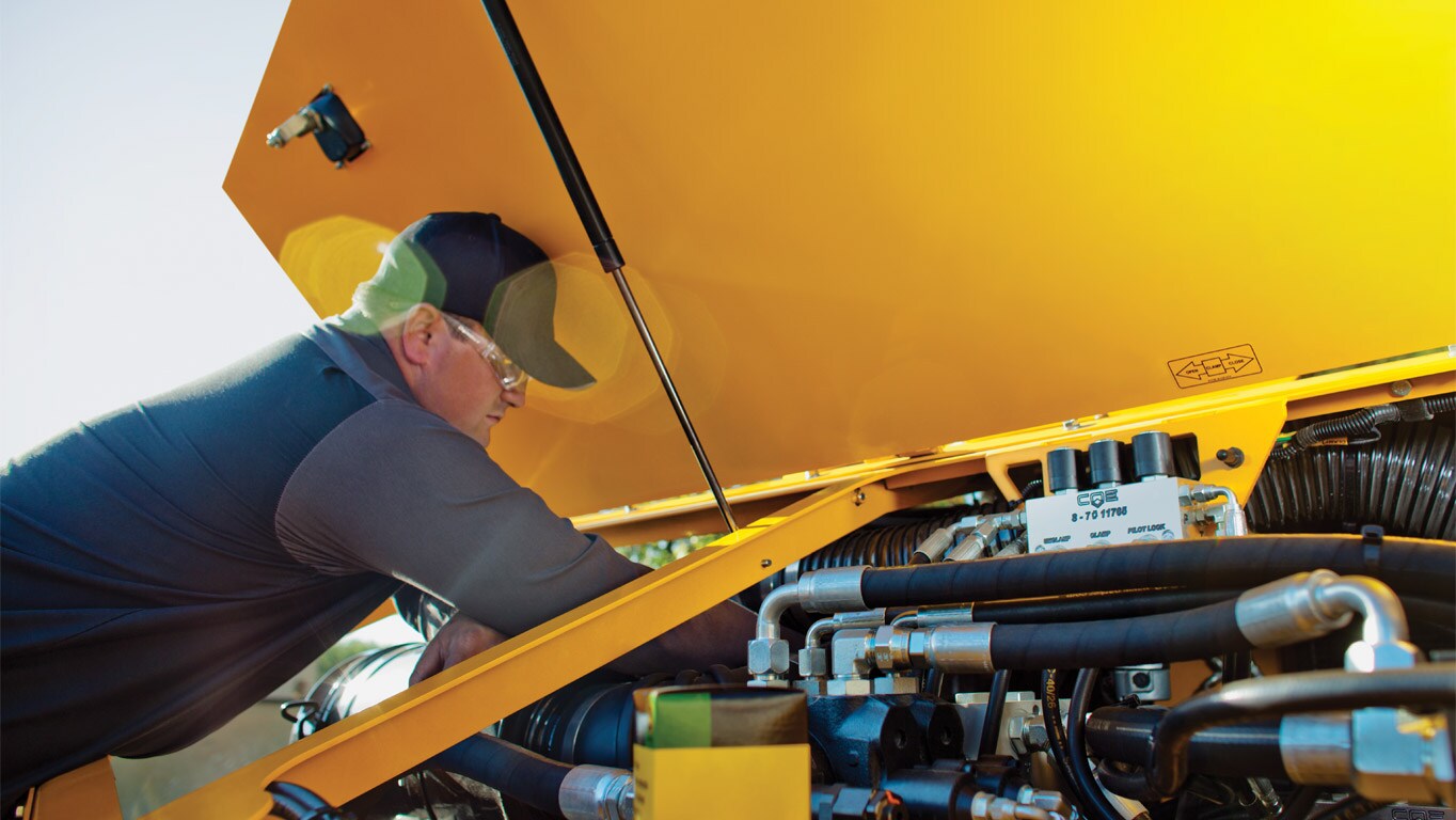 A smiling John Deere power systems customer