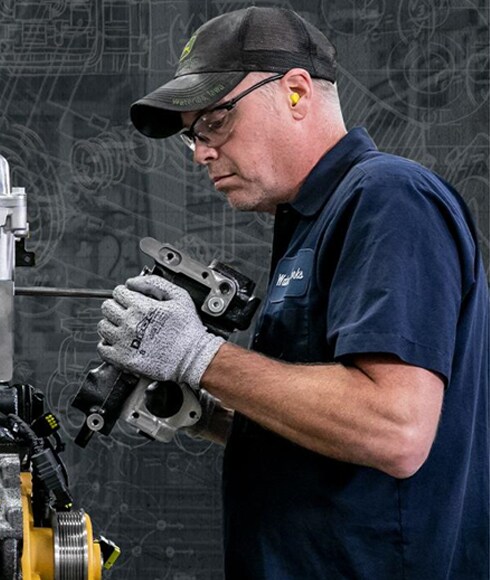 Man assembling engine