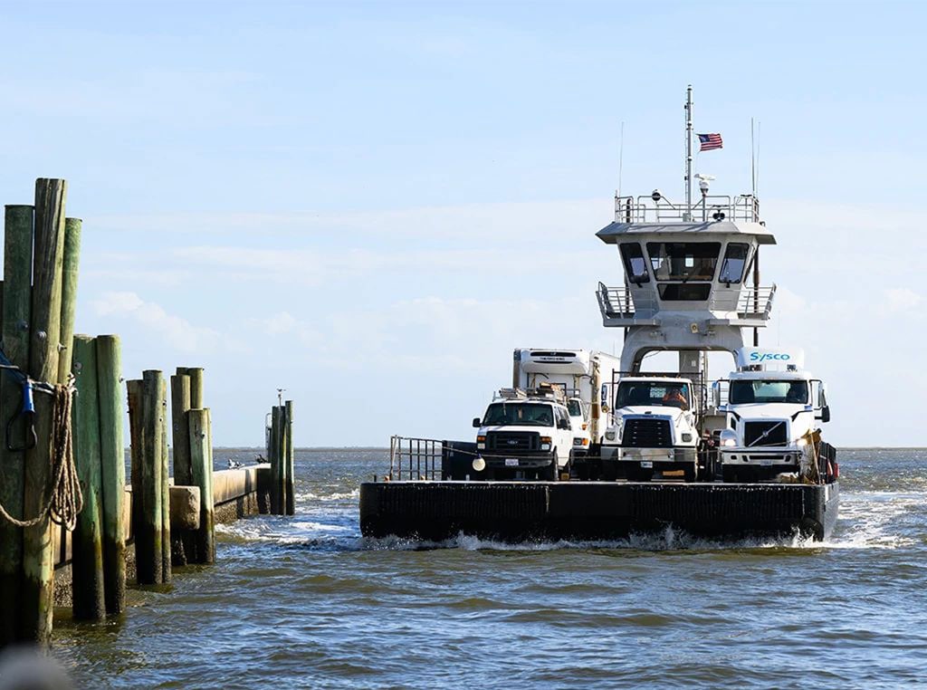 The Bald Head Island Barge marine vessel carrying vehicles through the waters off the coast of North Carolina