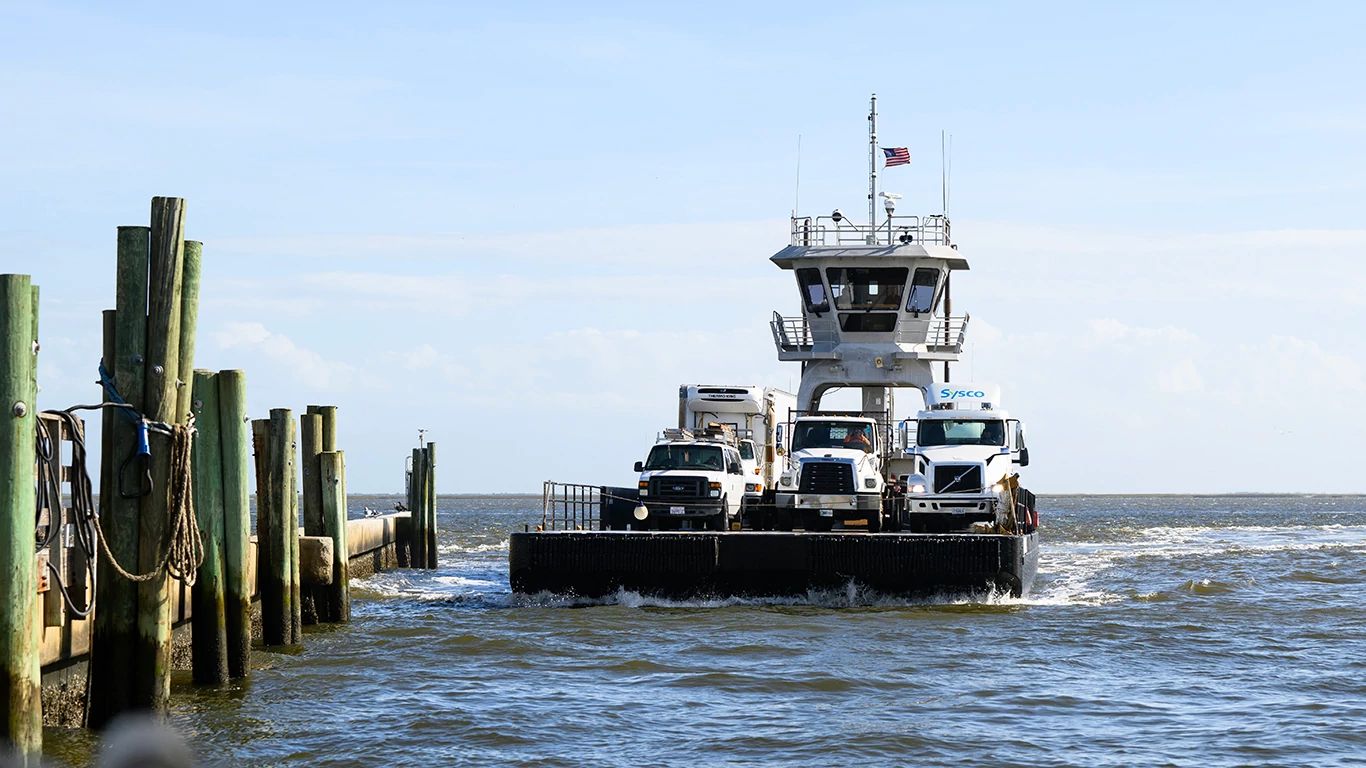 The Bald Head Island Barge marine vessel carrying vehicles through the waters off the coast of North Carolina 