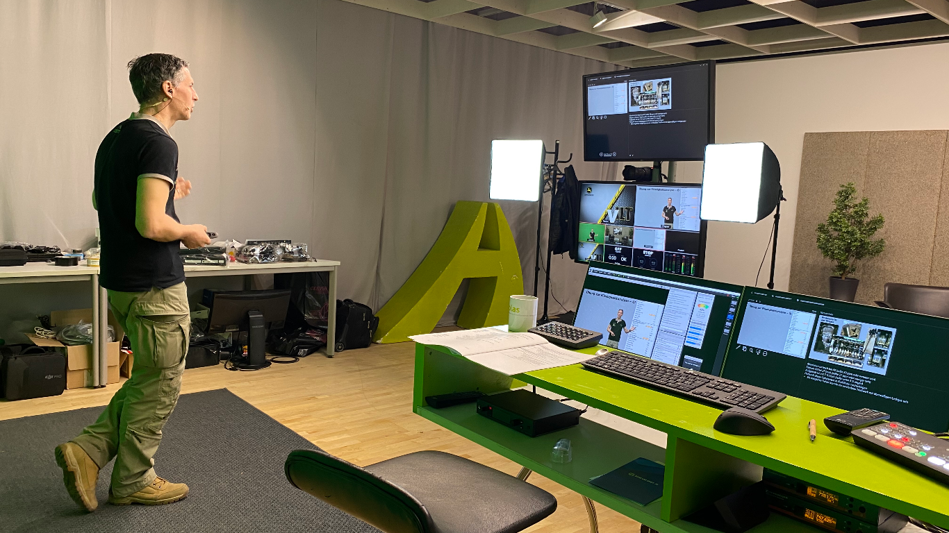 A John Deere engine diagnostics virtual instructor-led training in session.