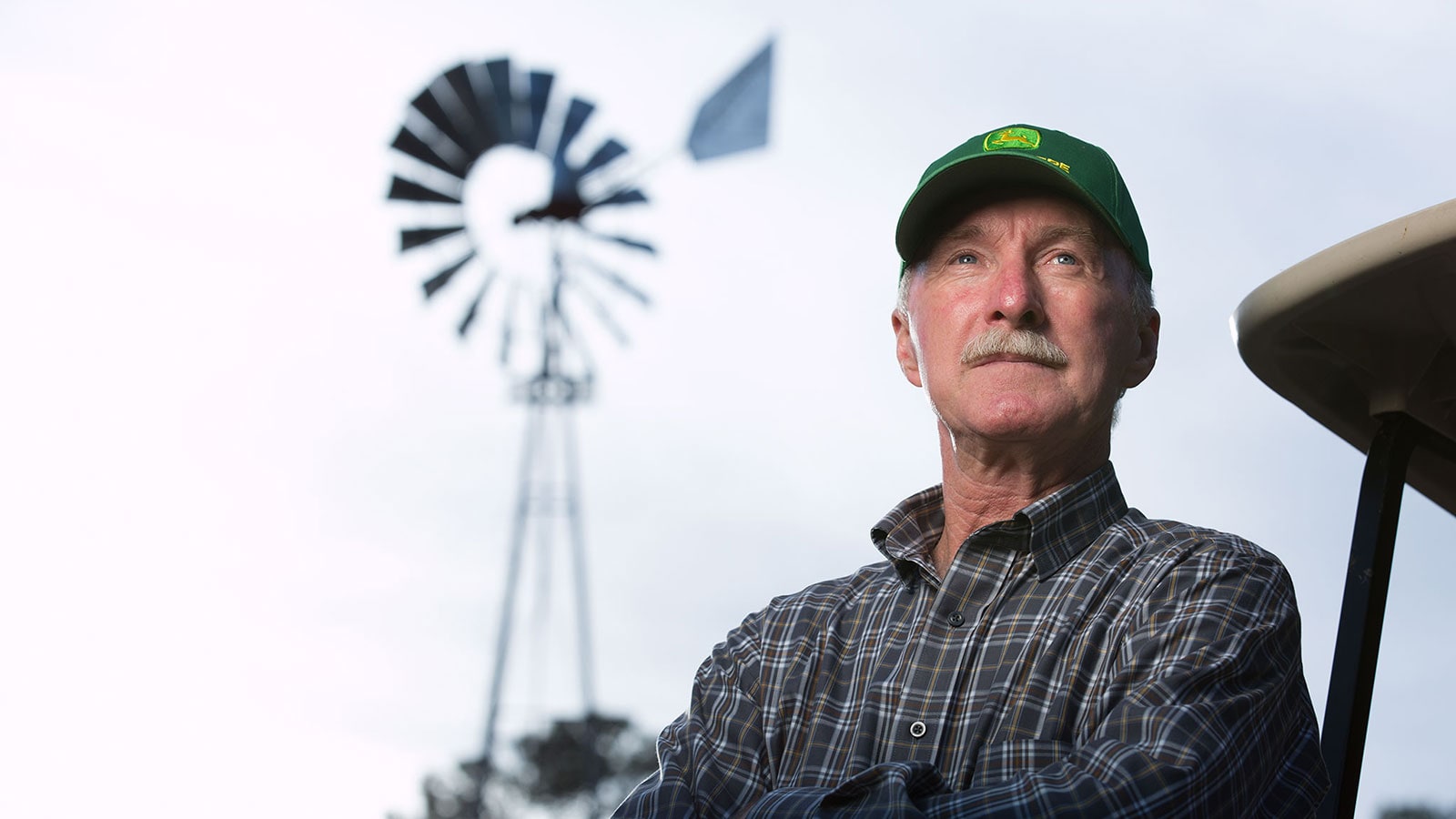 McGowin in the foreground with a windmill in the background