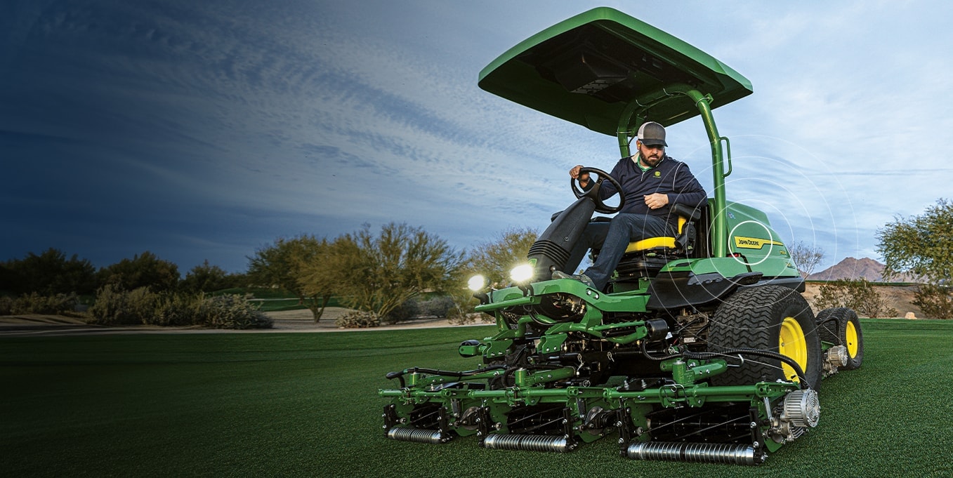  Person driving a John Deere vehicle