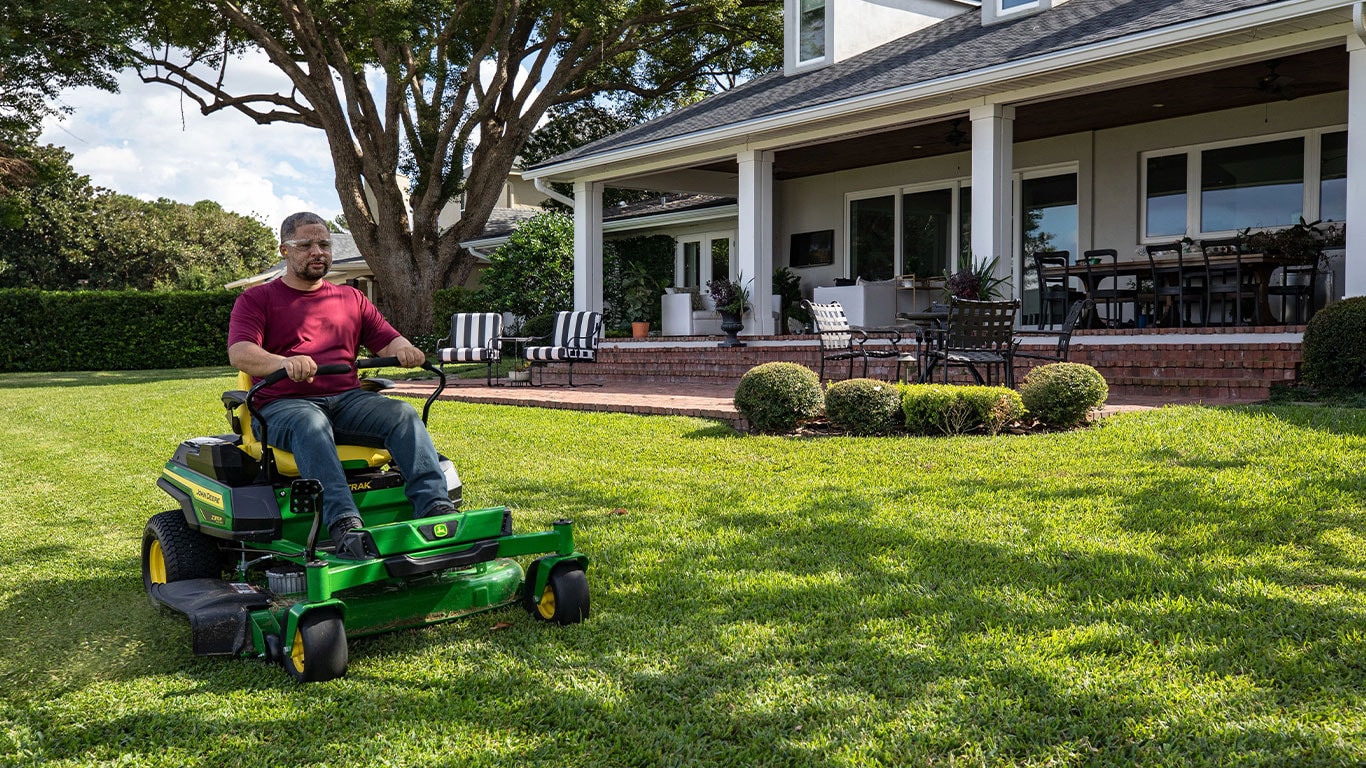 Z370R Electric ZTrak Mower in use in a backyard