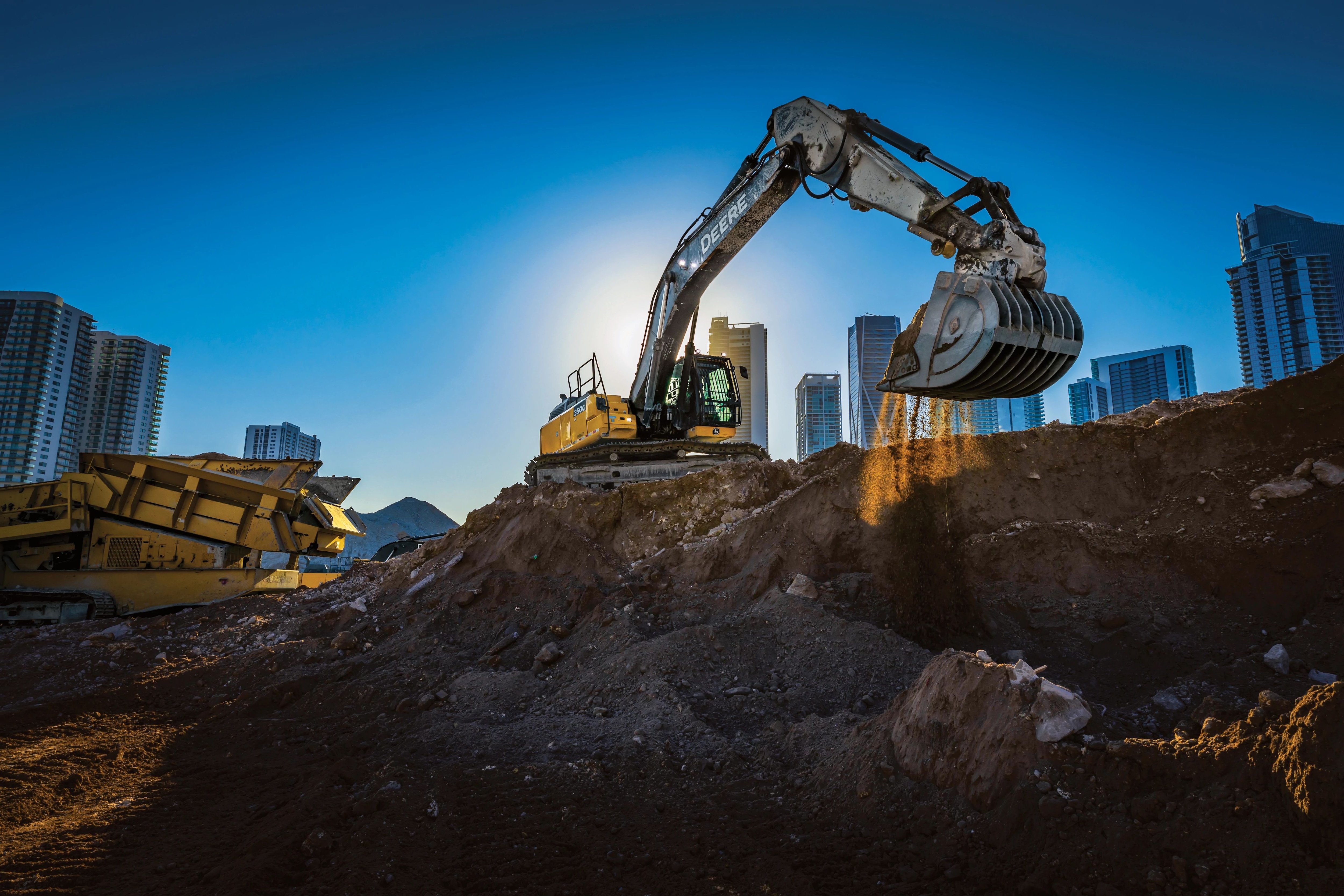 Photograph of John Deere excavator on a jobsite