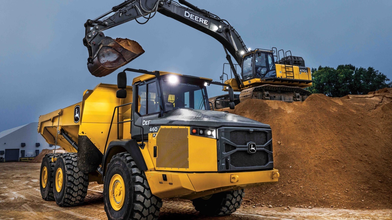 dirt being lifted and dropped into a 460 P-Tier Articulated Dump Truck