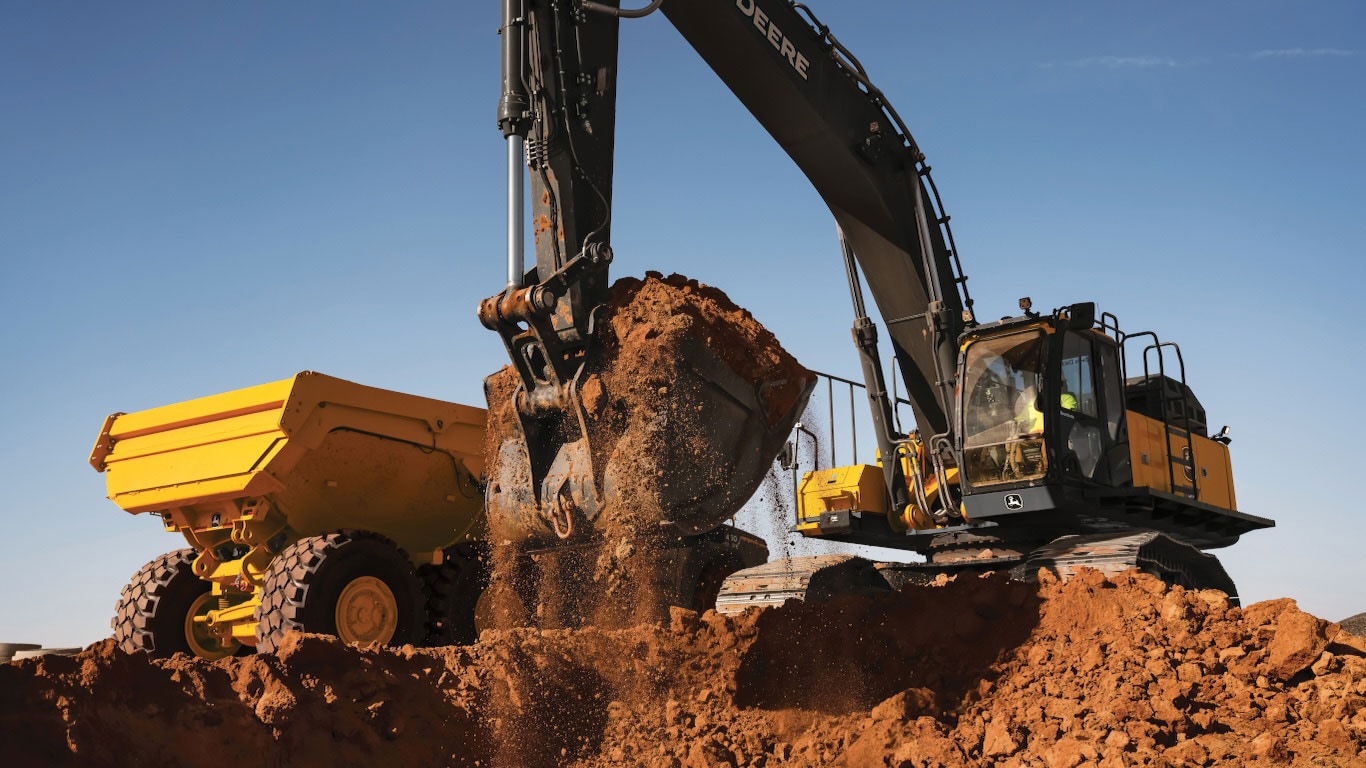The new 510 P-Tier Excavator scooping dirt 