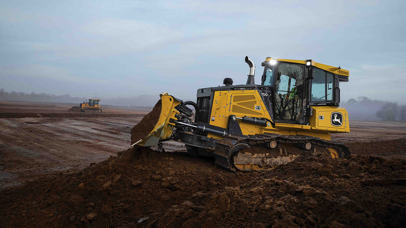 The John Deere 700 P-Tier Dozer with new technology moving dirt