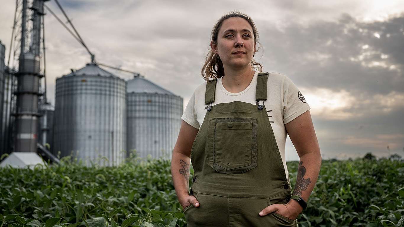 Betsy Rowland models the new Dovetail Workwear overalls in green