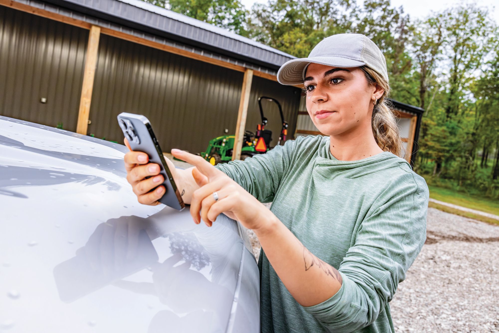 John Deere owner using PRO Service on phone