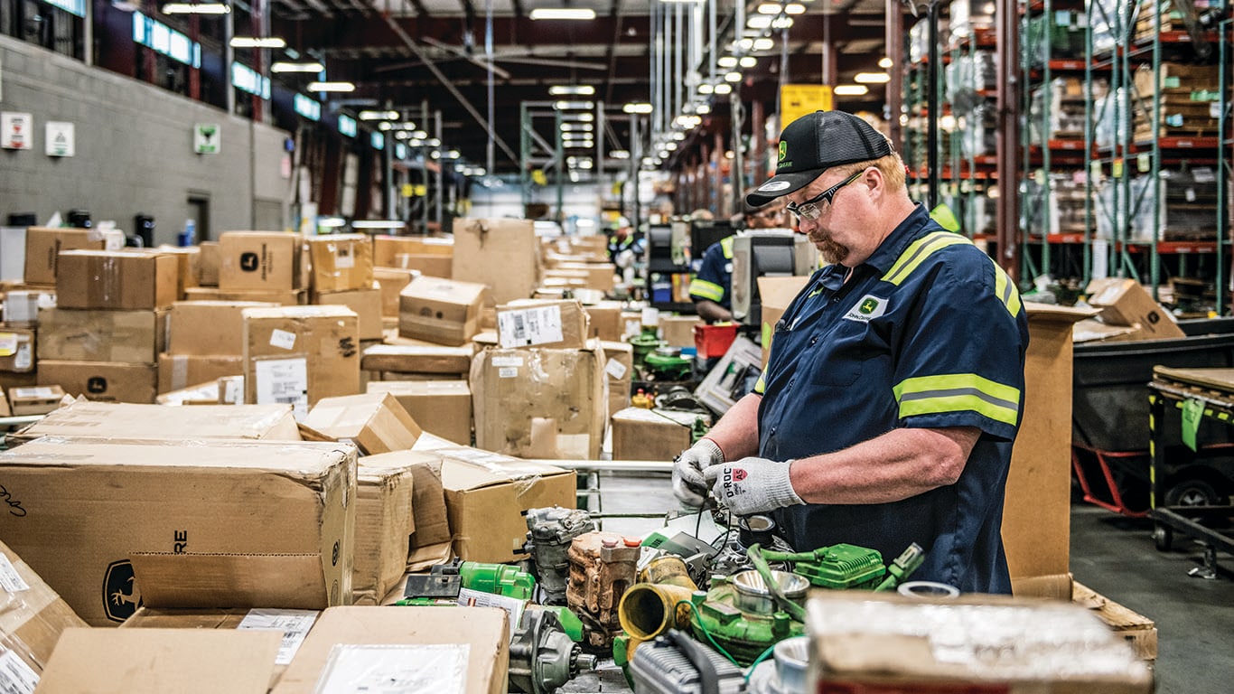 a Reman factory worker in Missouri carefully inspect wiring