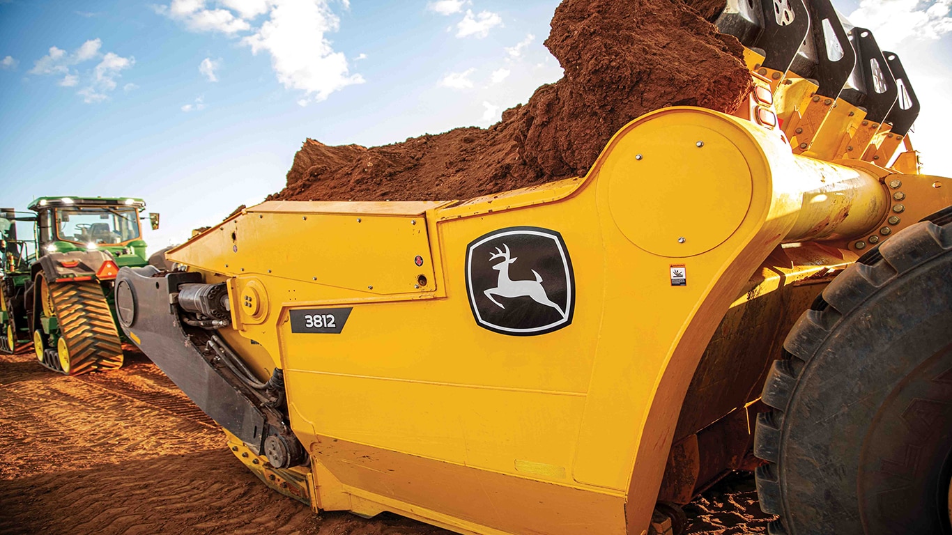 3812 Direct Hitch Scraper moving dirt.