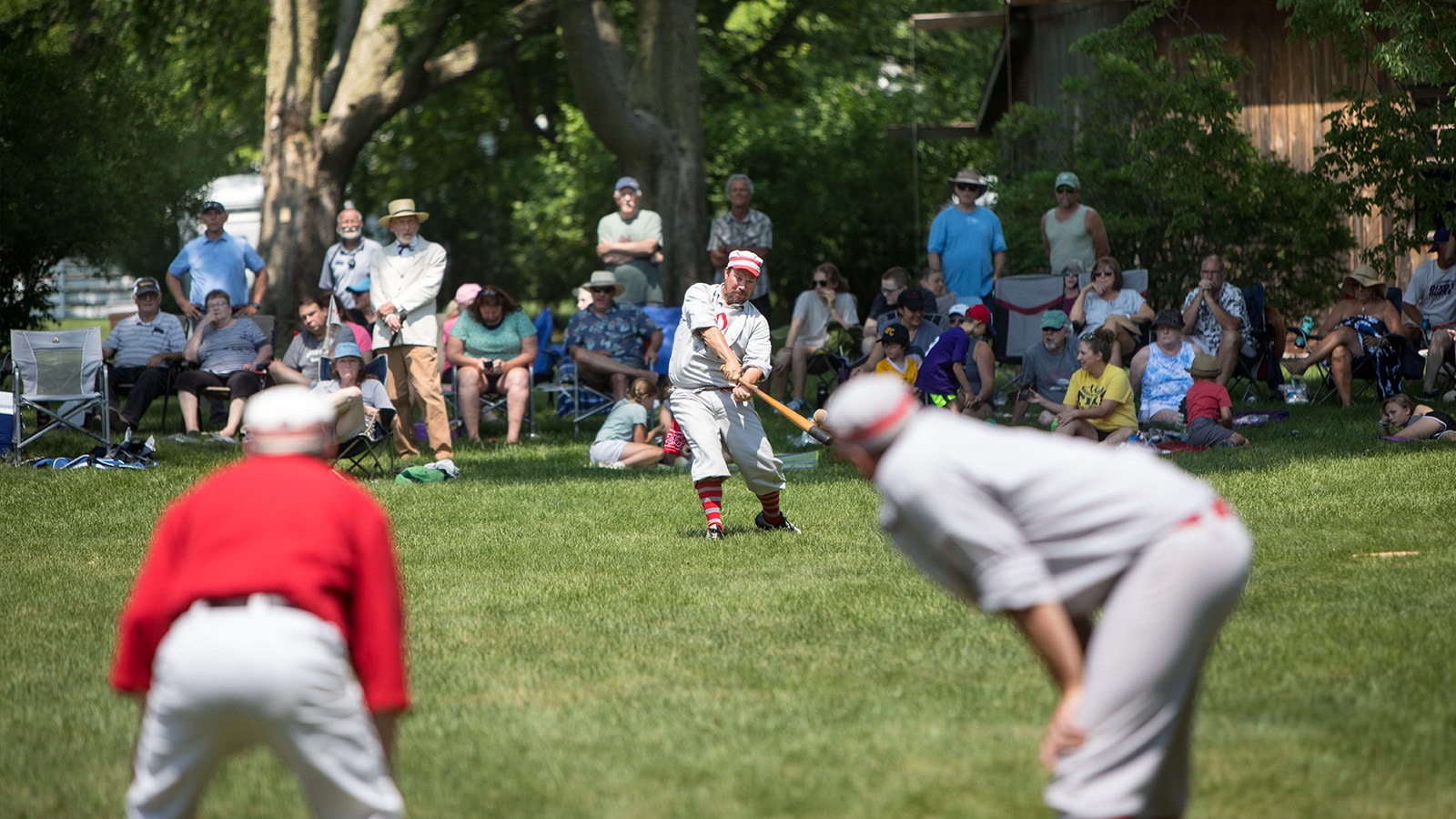 players compete in a vintage baseball game