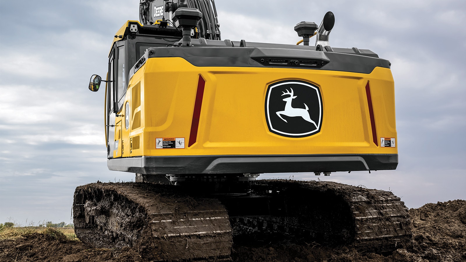 rear of a new mid-size excavator 