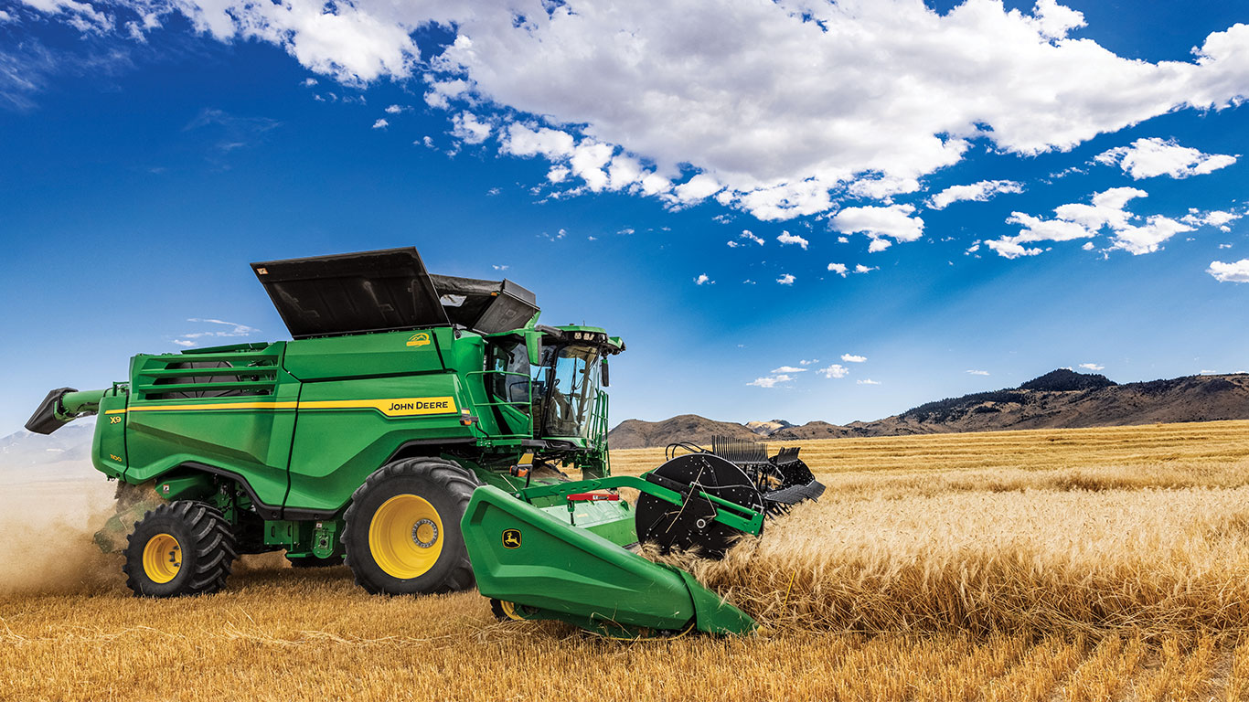 X9 1000 harvesting wheat.