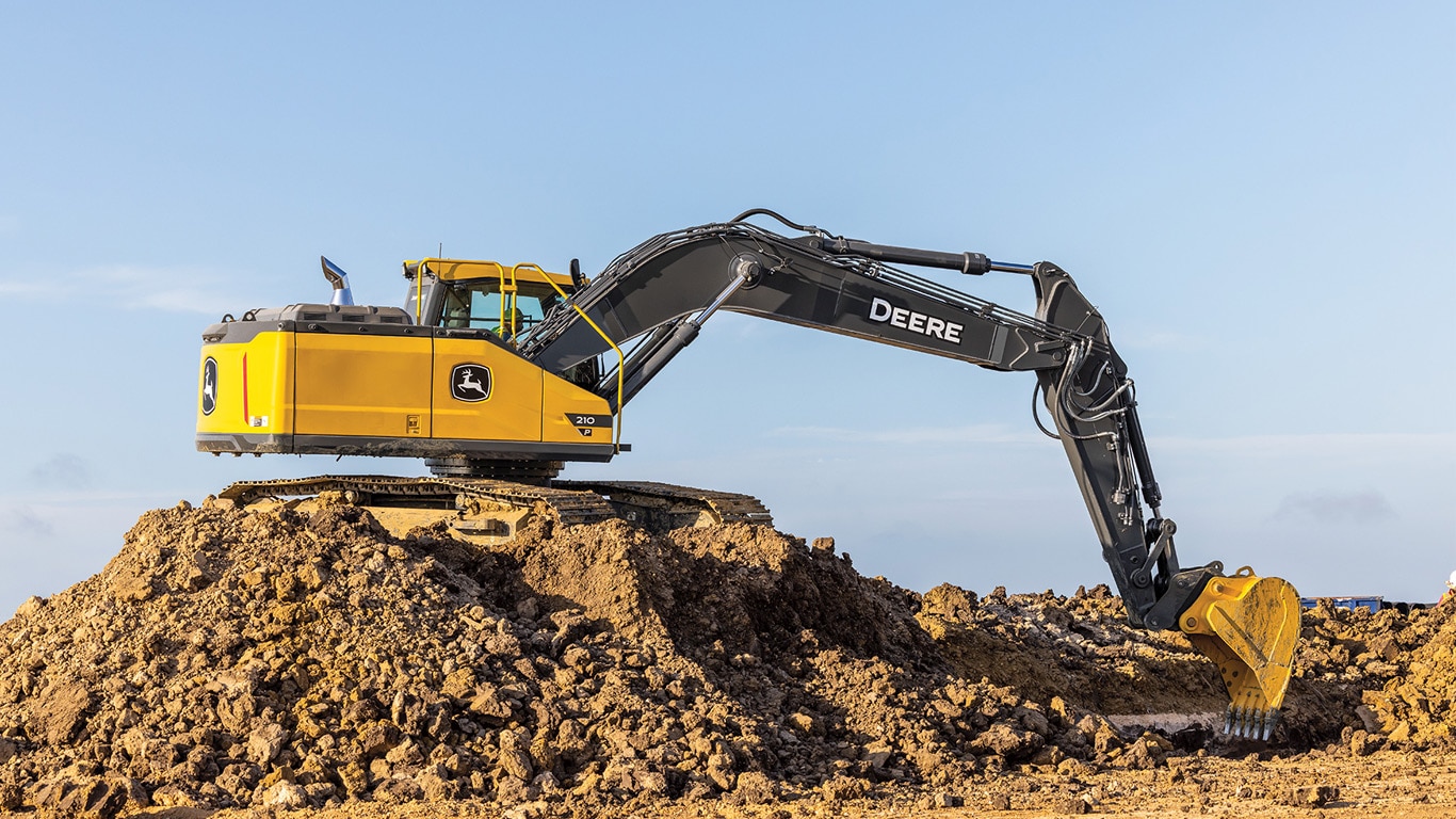 210 P-Tier Excavator digging a hole