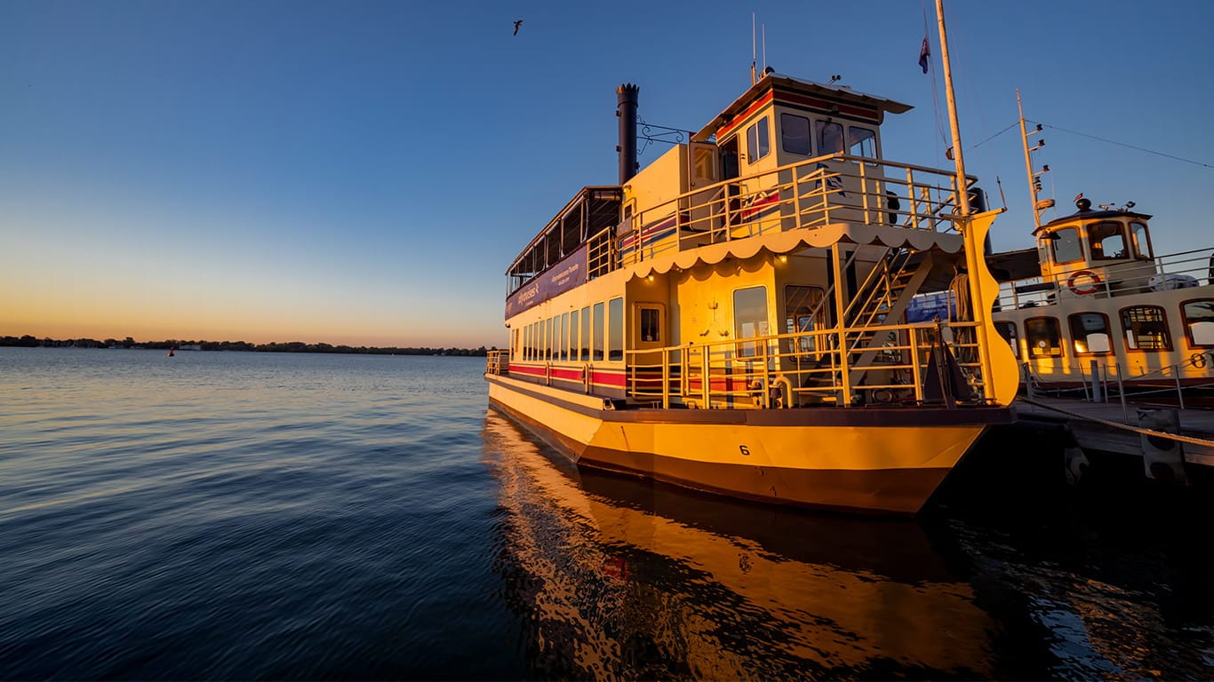 City Cruises’ Showboat Royal Grace repowered with John Deere marine engines docked at sunset